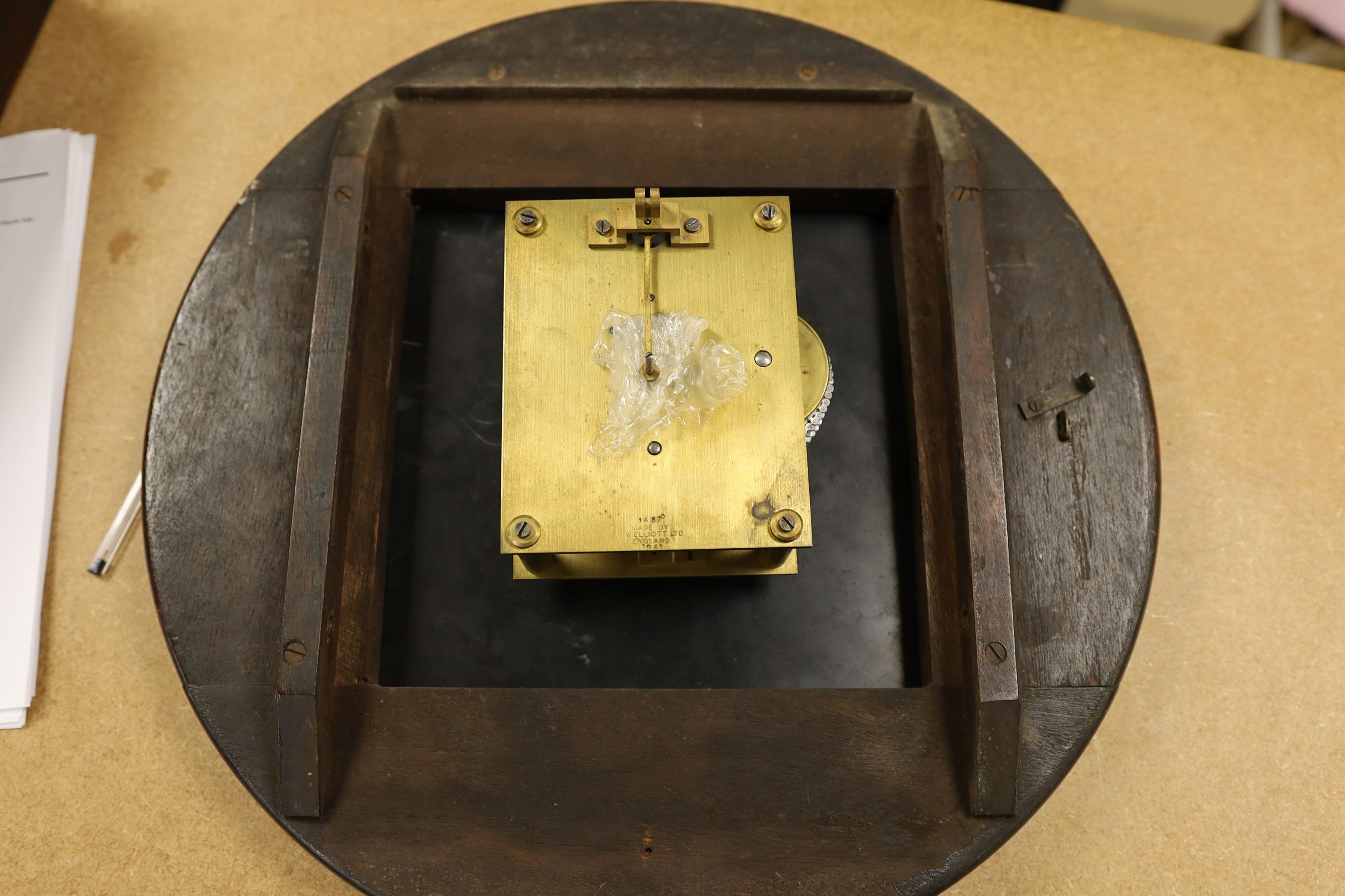 A mahogany dial clock, Marlborough Arms, Sedgmoor Place, London SE5., 48 cms diameter.